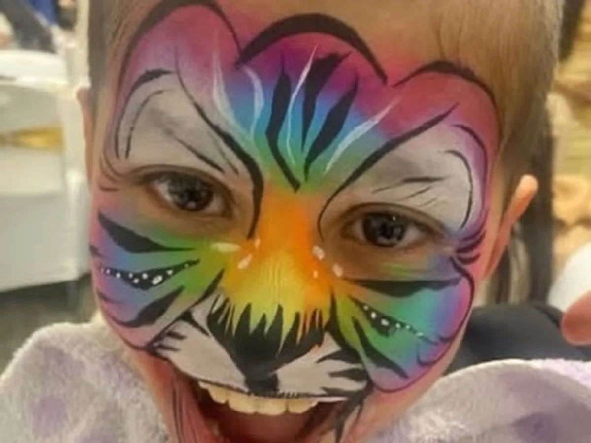 Colourful face painting on a child