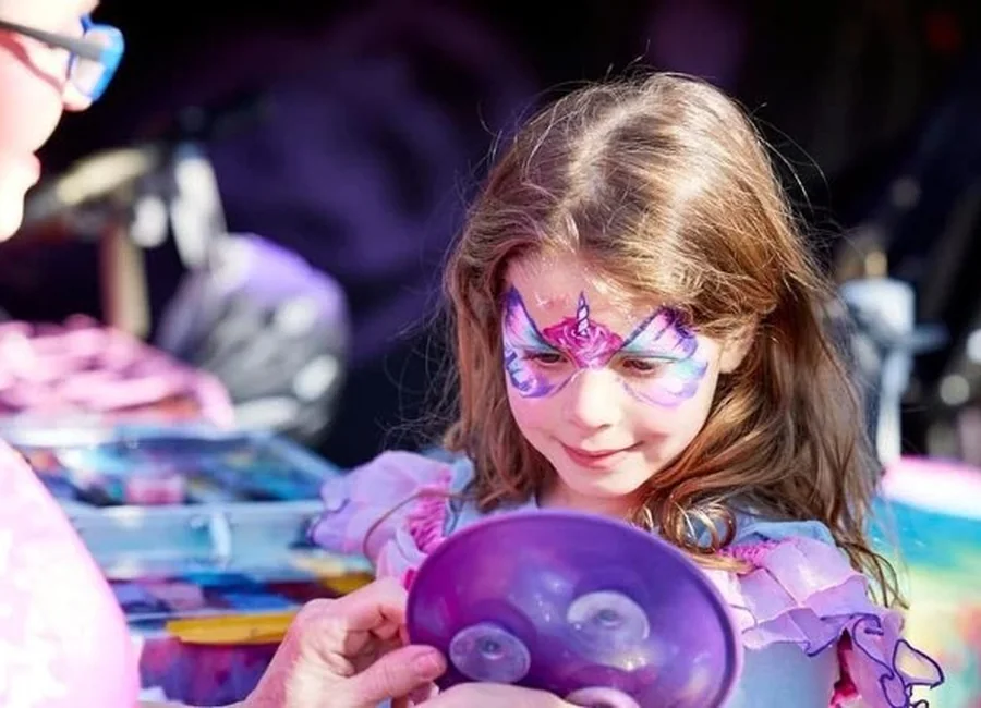 Child enjoying face painting
